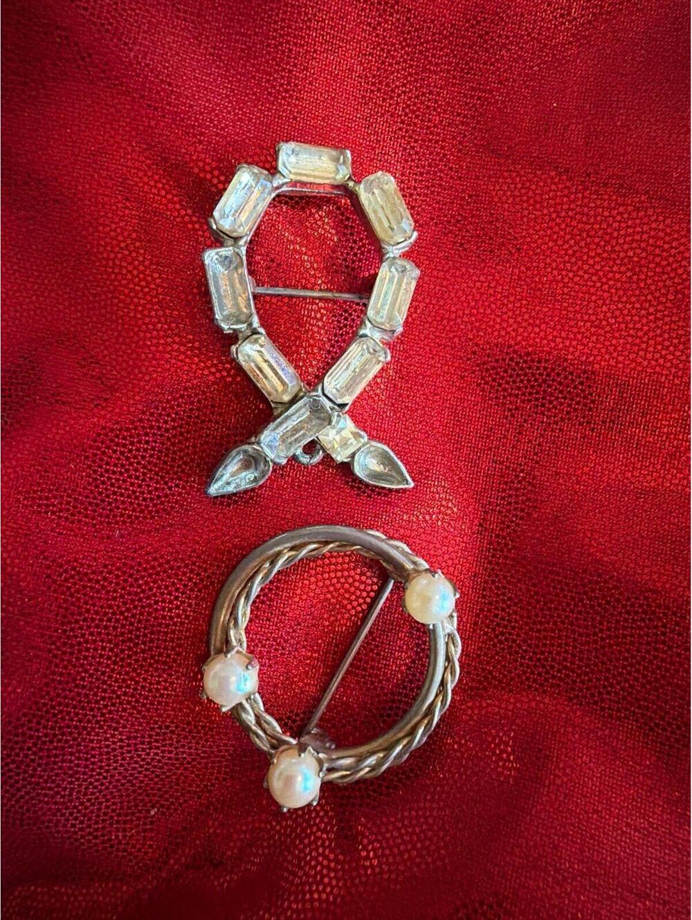 vintage costume jewelry brooches, featuring styles commonly attributed to design
